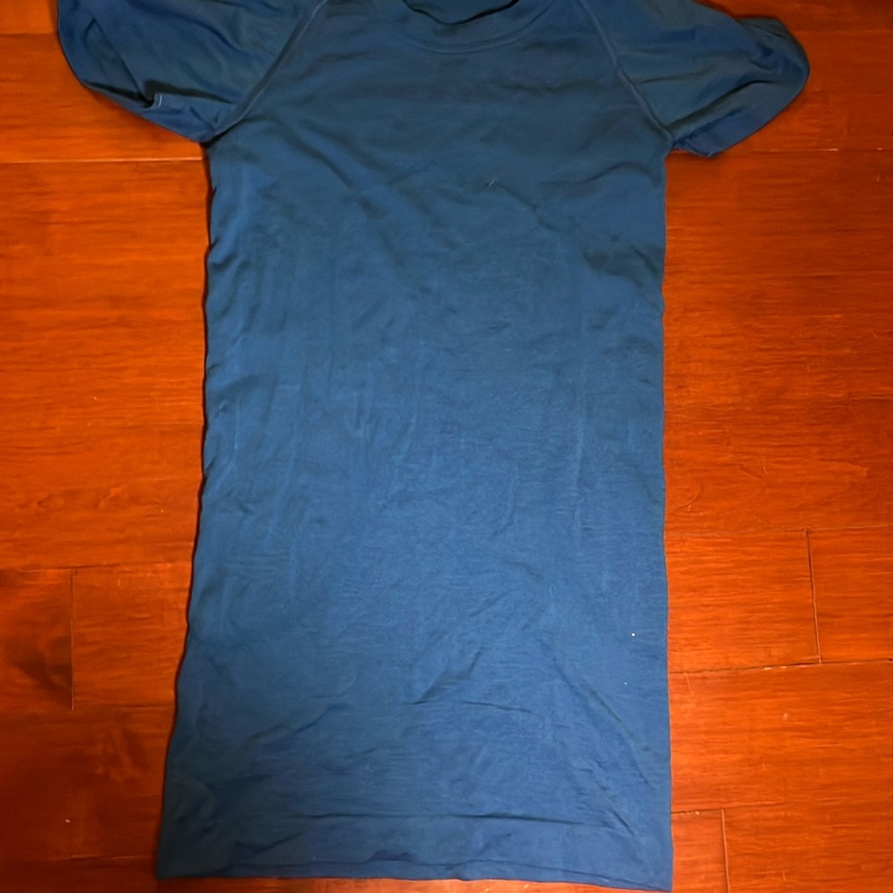 Lululemon blue shirt this color only available in summer time size 0